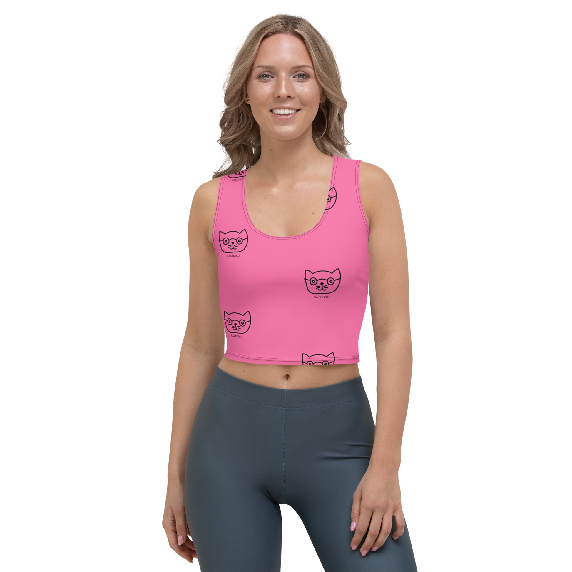 Pinkki crop-top kissa-printillä – leikkisä ja sporttinen valinta.